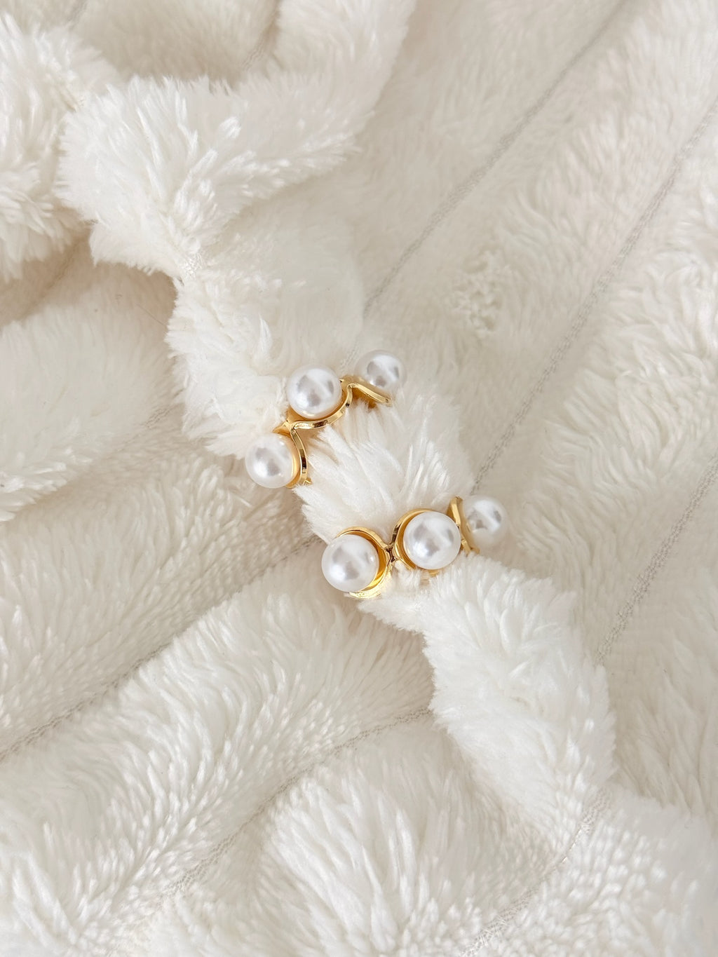 Aretes perlados