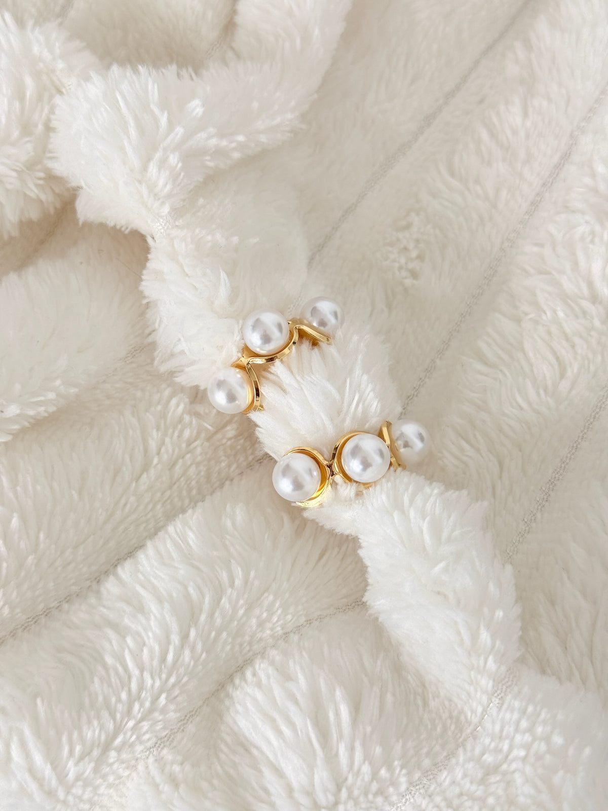 Aretes perlados
