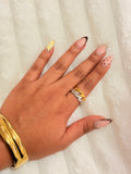 Anillo entrelazado bicolor