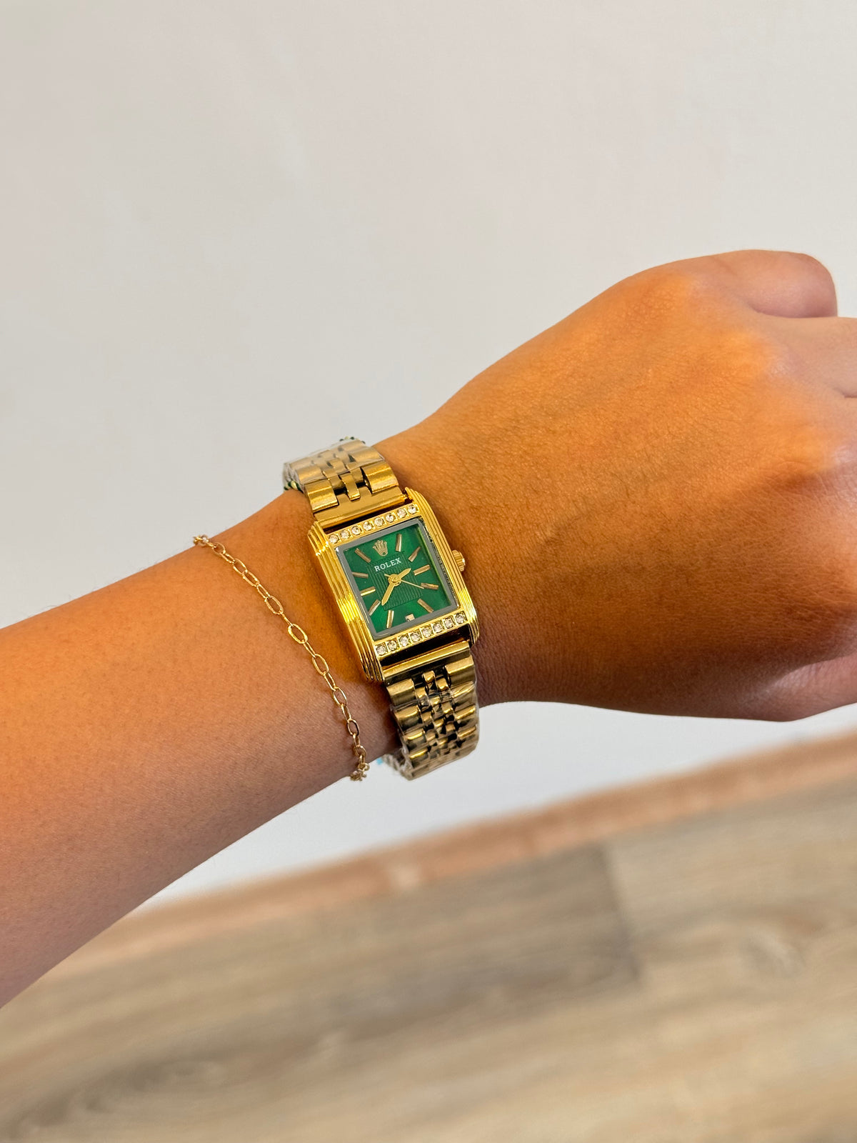 Reloj Rolex cara verde dorado