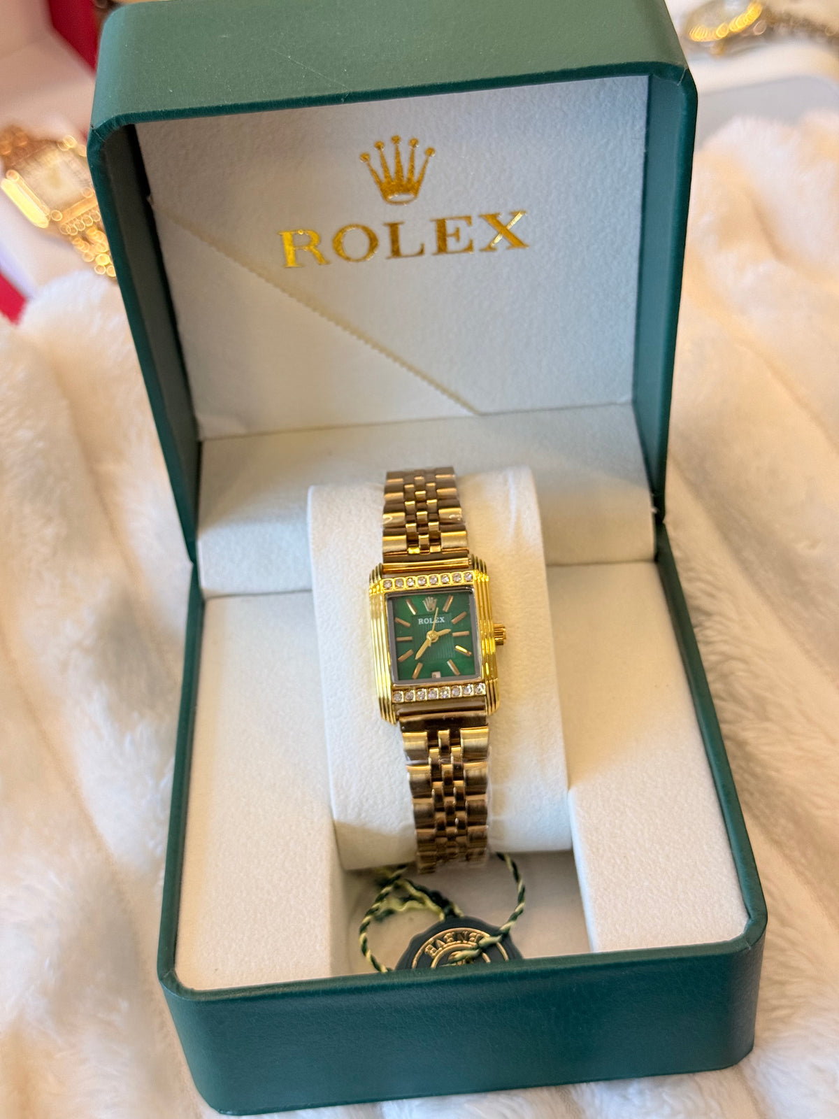 Reloj Rolex cara verde dorado