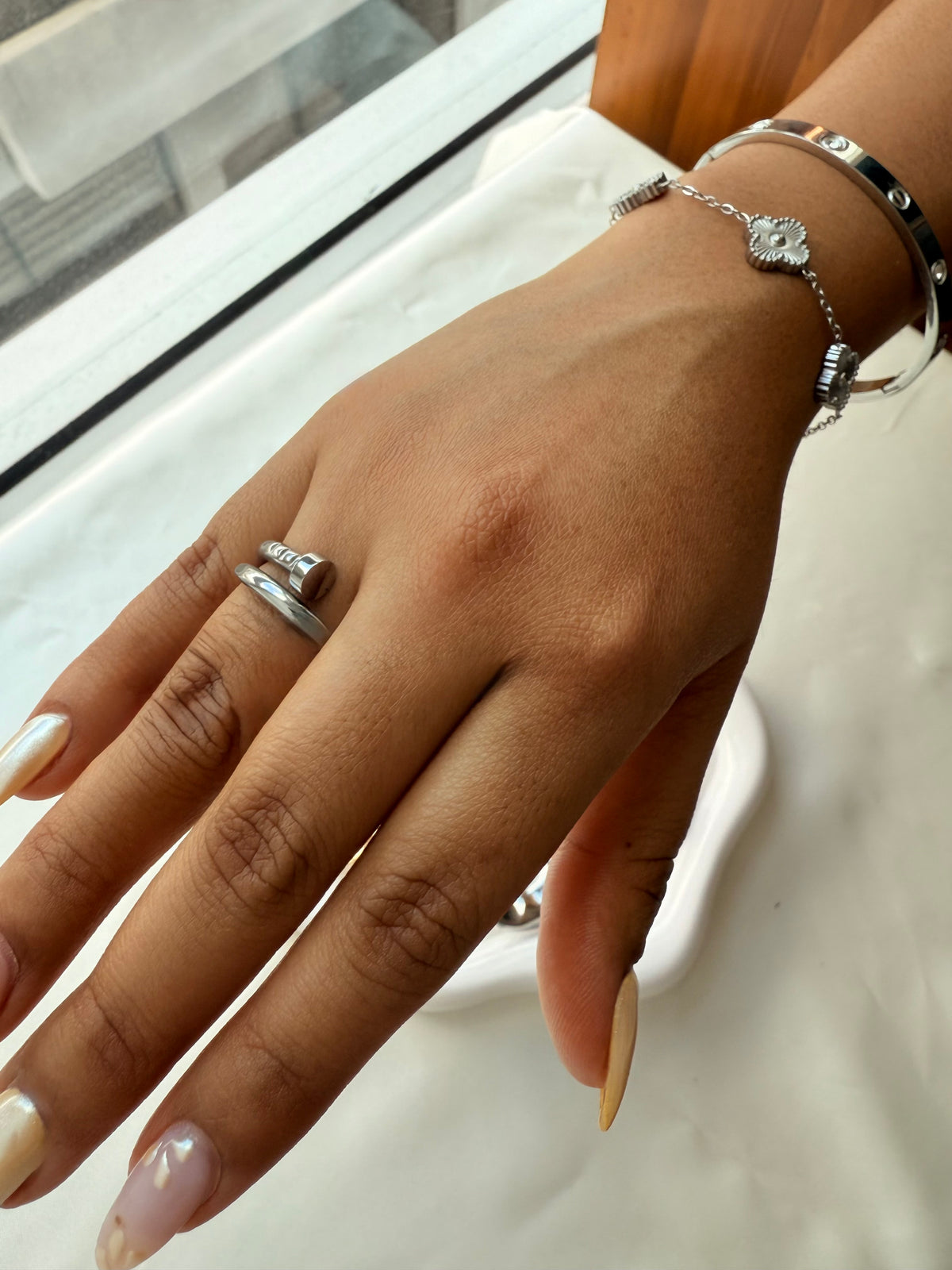 Anillo clavo plateado